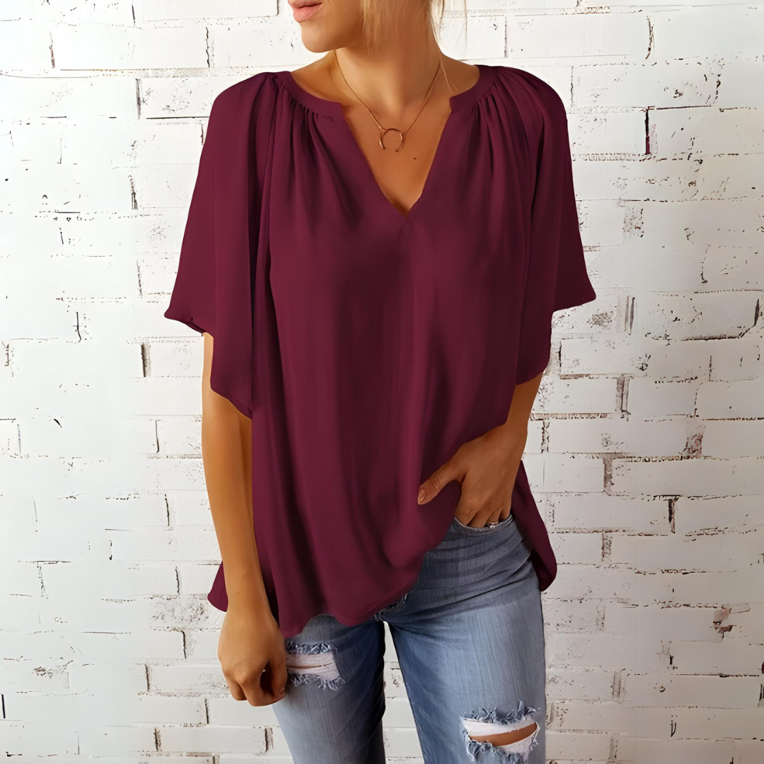 Tineke — Blusa feminina elegante com decote em V