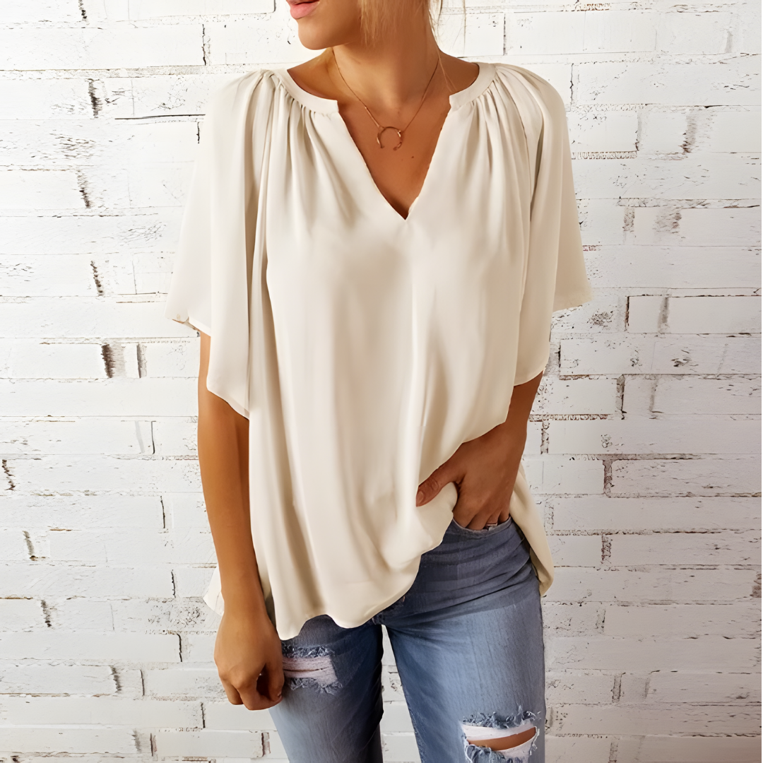 Tineke — Blusa feminina elegante com decote em V