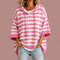 Poncho Loredana de malha às riscas com capuz, rosa